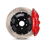 Close-up of a red TTSPORT 5430 4-piston forged brake caliper for the front wheel and a slotted 2-piece floating rotor.
