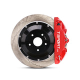 Close-up of a red TTSPORT 5440 4-piston forged brake caliper for the front wheel and a slotted 2-piece floating rotor.