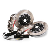 Complete TTSPORT EMB6 front wheel big brake kit, showing the 6-piston monoblock calipers, slotted 2-piece floating rotor, performance pads, and steel-braided brake lines.