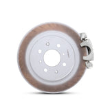 Close-up of a sliver TTSPORT Honda Fit/Jazz floating brake caliper for the rear wheel and a blank rotor.