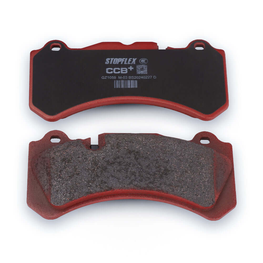 A set of TTSPORT 03 low-dust, silent brake pads on a white background, designed for carbon-ceramic discs.