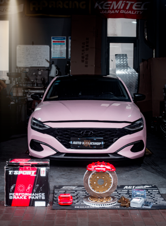 Hyundai Festa fitted with the TTSPORT Classic 5410 forged big brake kit behind the factory wheel
