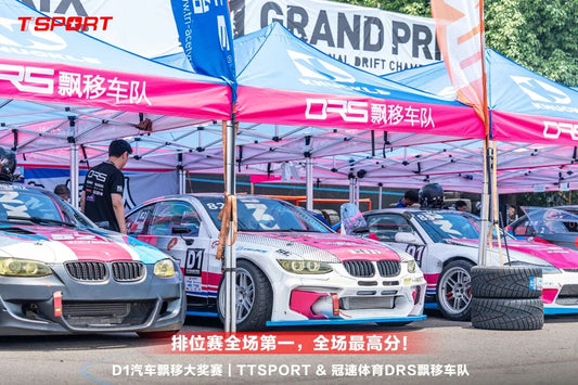 Drift car kicking up tire smoke during D1GP Chengdu round at Maojiawan Circuit