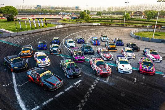 Royal Drift Series cars trail tire smoke through a corner at Shanghai's Tianma Circuit