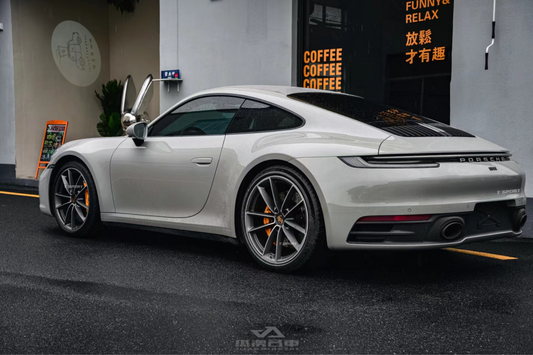 Porsche 911 Carrera fitted with upgraded OEM Brembo calipers and TTSPORT high-carbon heat-treated rotors