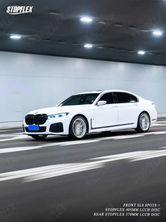 BMW 7 Series with TTSPORT Slim SL8 eight-piston big brake kit installed behind the factory 20-inch wheel
