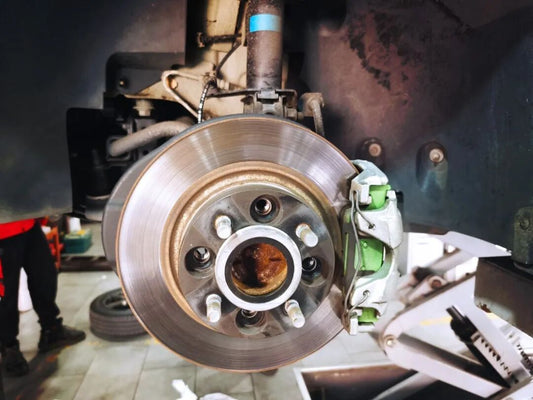 Mercedes-Benz Smart fitted with TTSPORT Slim four-piston forged big brake kit behind the stock 15-inch wheel