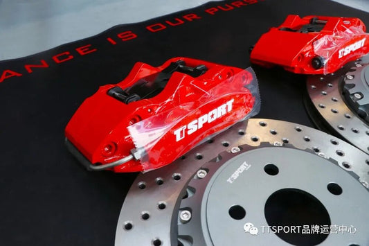Lexus CT200h fitted with TTSPORT 5420 four-piston caliper and 285mm drilled rotor behind stock 16-inch wheel