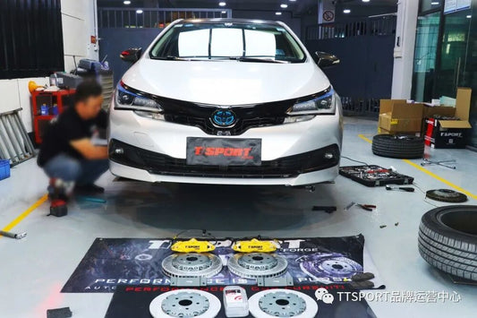 Toyota Corolla hybrid fitted with TTSPORT 9200 four-piston front caliper behind a 17-inch wheel