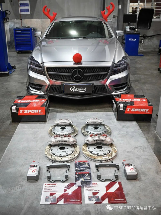 Mercedes-Benz CLS rear wheel showing the TTSPORT four-piston rear caliper and 380mm drilled rotor
