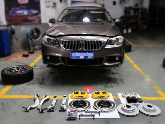 BMW 5 Series G38 wearing a TTSPORT 8703S six-piston big brake kit behind an 18-inch wheel