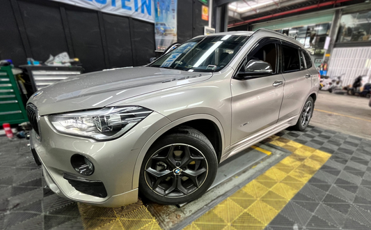 BMW X1 fitted with TTSPORT 8657 six-piston big brake kit behind 18-inch factory wheel