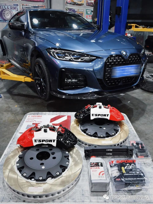 BMW 4 Series front axle fitted with the TTSPORT 8705 six-piston big brake kit behind a 19-inch wheel