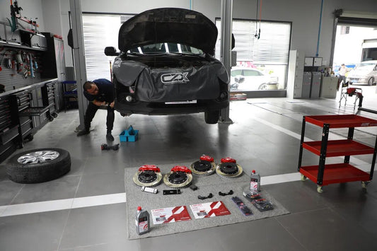 Honda CR-V fitted with a TTSPORT front-and-rear big brake kit behind 17-inch wheels