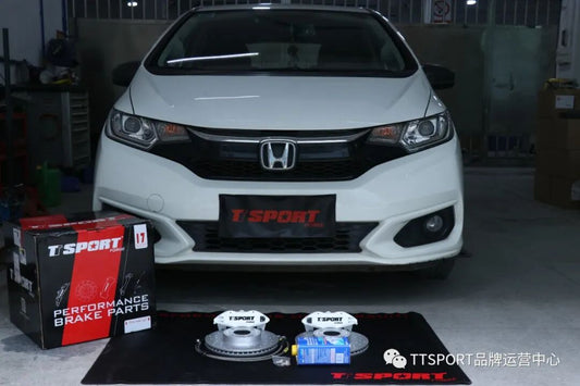 Honda Fit/Jazz GK5 fitted with a TTSPORT Slim WD4 forged four-piston big brake kit behind its 15-inch OEM wheel