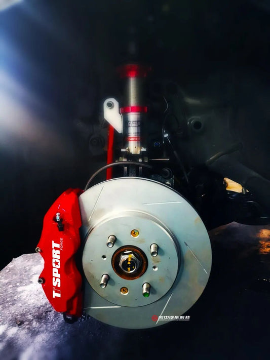 Honda Fit/Jazz fitted with a red TTSPORT SP forged four-piston big brake kit behind a 16-inch wheel