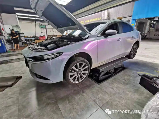 Mazda 3 Axela wheel showing TTSPORT Classic 5410 forged four-piston big brake kit installed