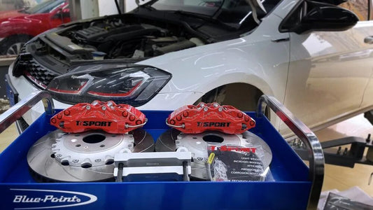 Volkswagen Golf front wheel fitted with a TTSPORT 9040 forged six-piston caliper and 355mm slotted rotor