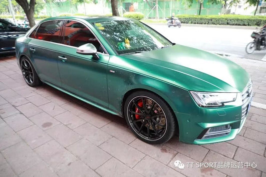 Audi A4 B9 with red TTSPORT 8703 six-piston front caliper and matching rear brake upgrade
