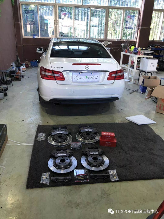 Mercedes-Benz E260 W212 fitted with TTSPORT Classic Series 8657 six-piston front big brake kit behind an OEM 18-inch wheel