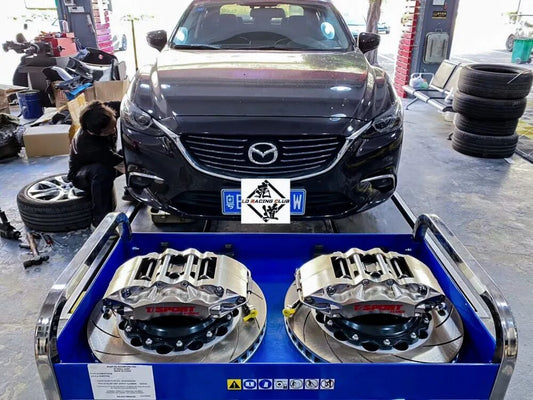 Mazda Atenza fitted with a TTSPORT 9040 six-piston big brake kit behind the factory 19-inch wheel