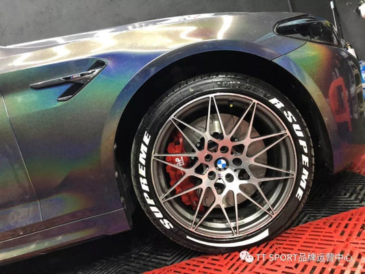 BMW 5 Series with AP8520 six-piston caliper and TTSPORT 380mm slotted rotor tucked behind a 19-inch wheel