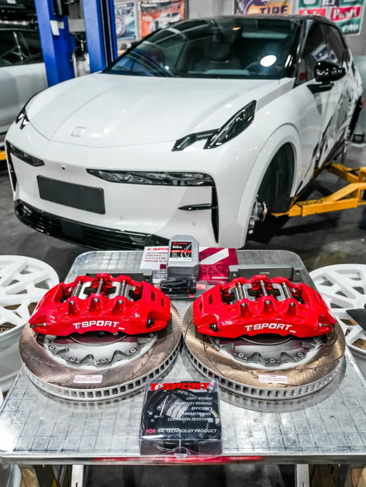 Zeekr X front corner fitted with TTSPORT Evolution EB8 eight-piston forged big brake kit behind 21-inch wheel