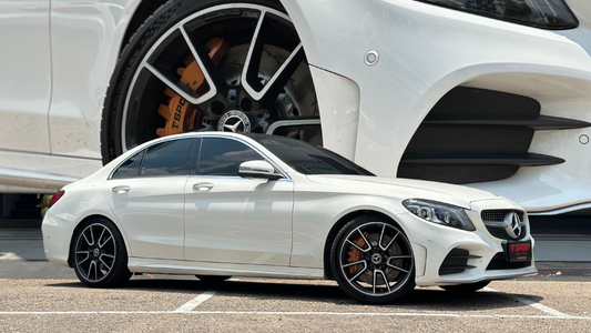 Mercedes-Benz C300 fitted with TTSPORT Evolution EB6 gold six-piston big brake kit behind a 19-inch wheel
