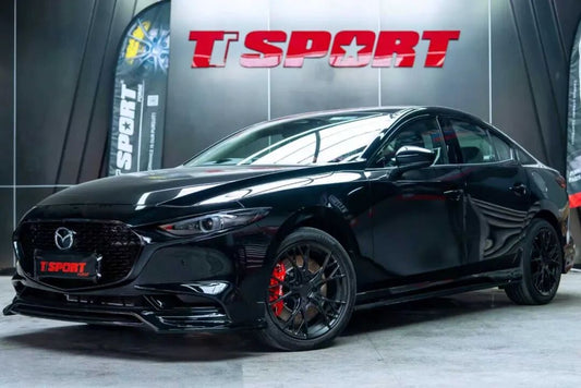 Blacked-out JDM Mazda3 Axela fitted with a TTSPORT Evolution EB4 four-piston front brake kit