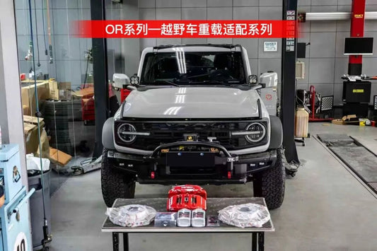 Ford Bronco with TTSPORT OR6 six-piston front big brake kit installed behind the factory 17-inch wheel.