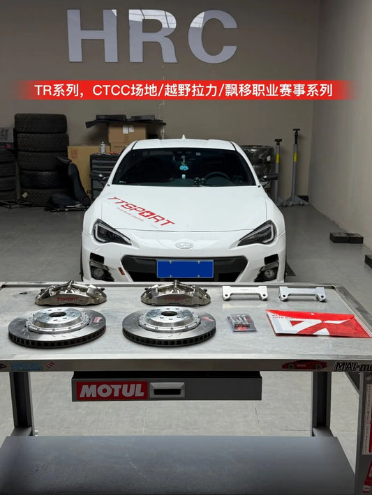 Subaru BRZ with TTSPORT TR40 four-piston front Big Brake Kit and 330 mm racing rotors behind 17-inch wheels.