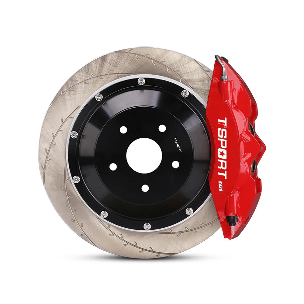 Close-up of a red TTSPORT 5430 4-piston forged brake caliper for the front wheel and a slotted 2-piece floating rotor.