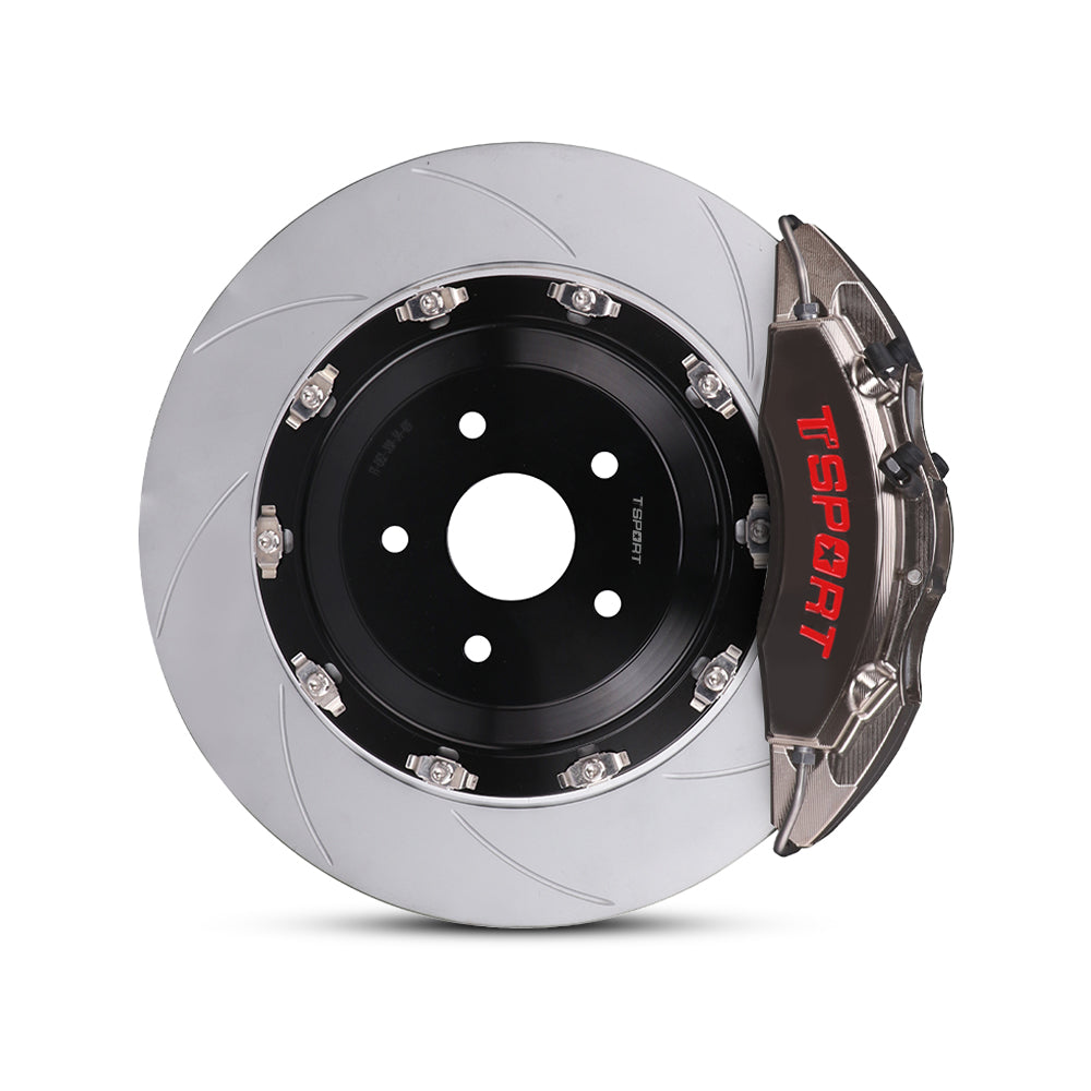 Close-up of a chrome TTSPORT DRT4+2 6-piston forged brake caliper for the rear wheel and a slotted 2-piece floating rotor.