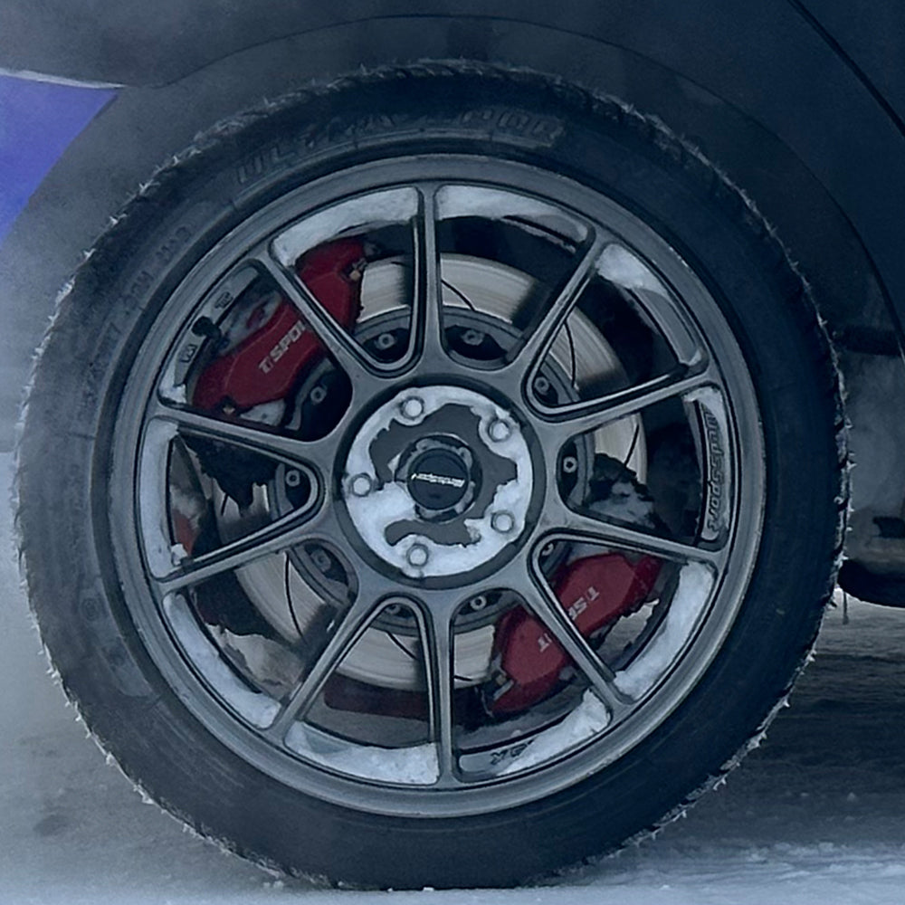 A red TTSPORT DRT4+4 4-piston brake kit is installed on the rear wheel.
