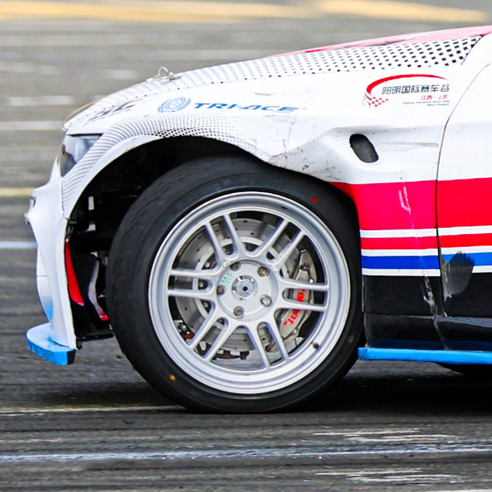 A chrome TTSPORT 6-piston drift brake kit is installed on the front wheel.