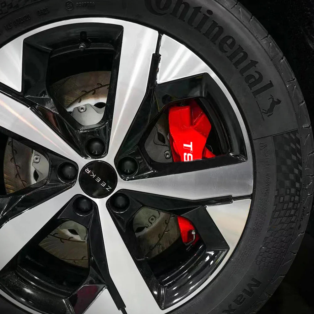 A red TTSPORT ES6 6-piston big brake kit is installed on the 19" front wheel.