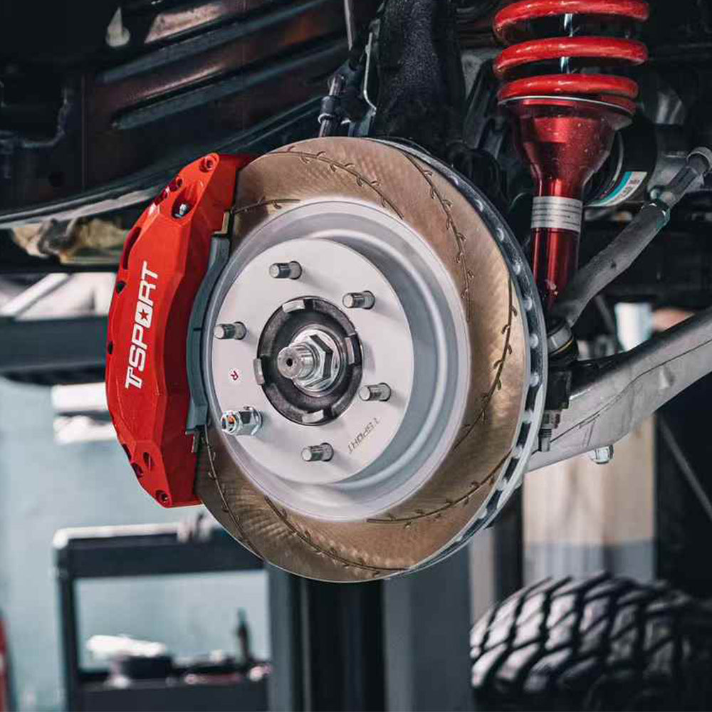 A red TTSPORT PB6 6-piston big brake kit is installed on the 2024 Ford Bronco front wheel.