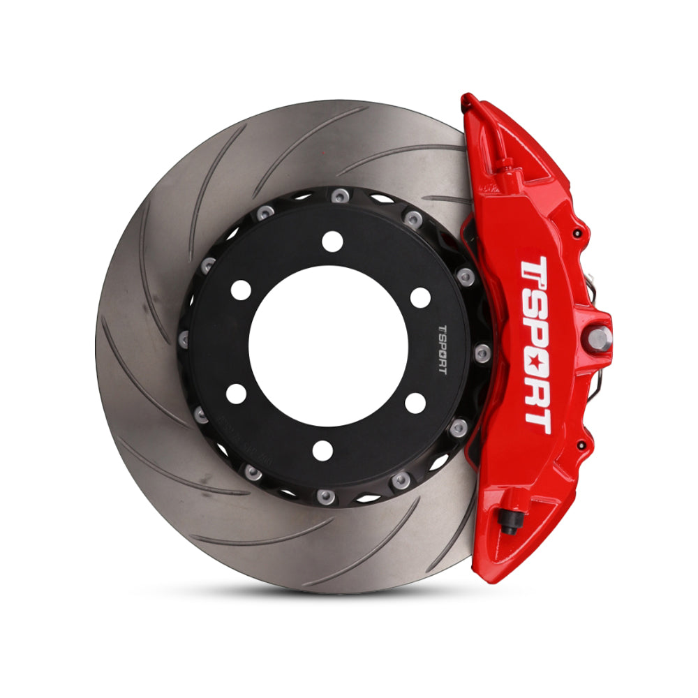 Close-up of a red TTSPORT Toyota Tundra & Sequoia 6-piston forged brake caliper for the front wheel and a slotted 2-piece rotor.
